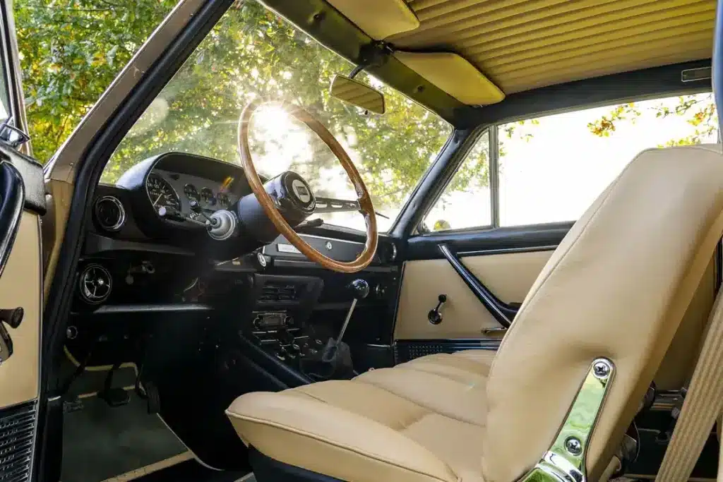 Full cabin restoration in classic sedan with custom upholstery and trim