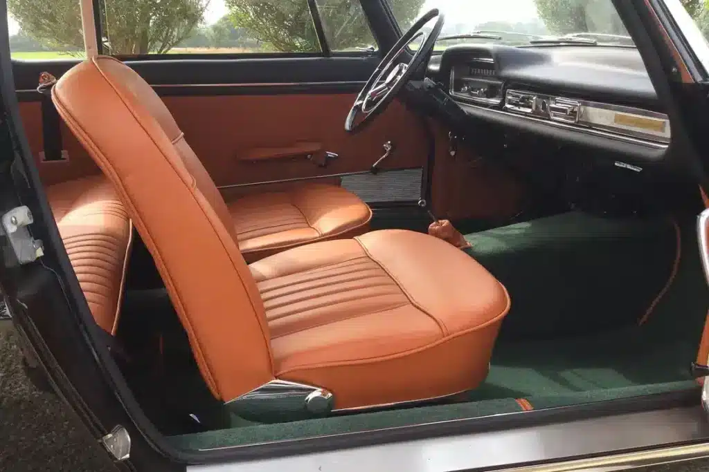 Rebuilt foam and reupholstered bucket seats in 1970s muscle car