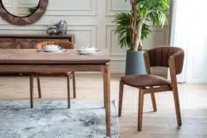 Dining chair reupholstered with stain-resistant fabric and reinforced frame