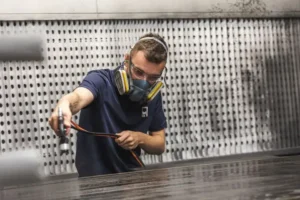 team members spraying table